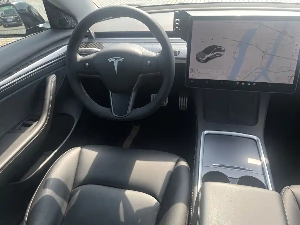 Tesla Model 3 — фото 14