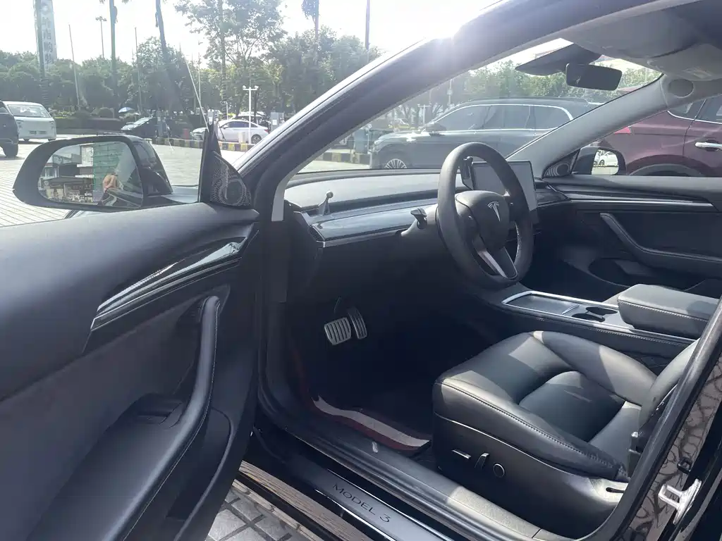 Tesla Model 3 — фото 20