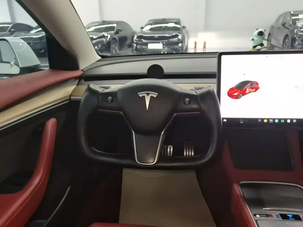 Tesla Model 3 — фото 11