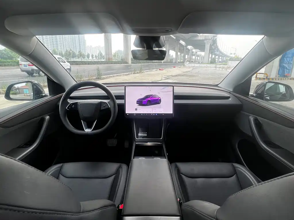Tesla Model Y — фото 7