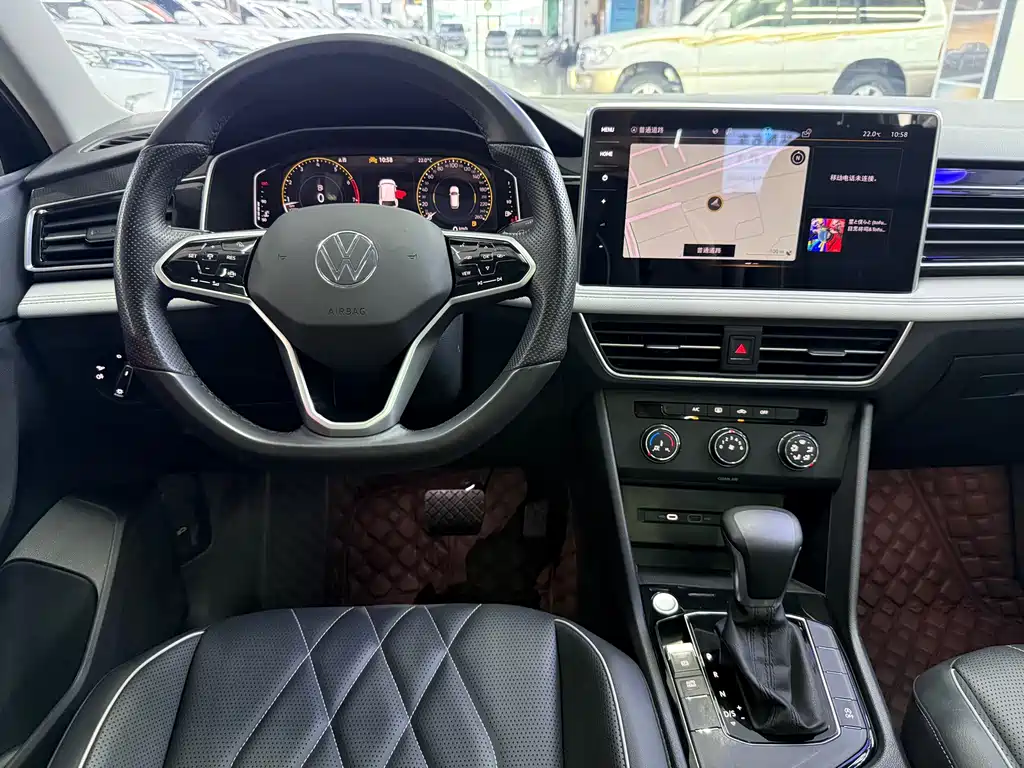 Volkswagen Tiguan L — фото 11