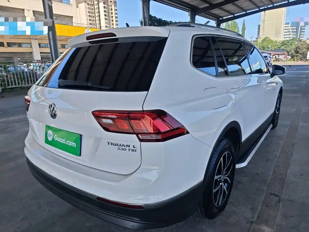 Volkswagen Tiguan L — фото 7