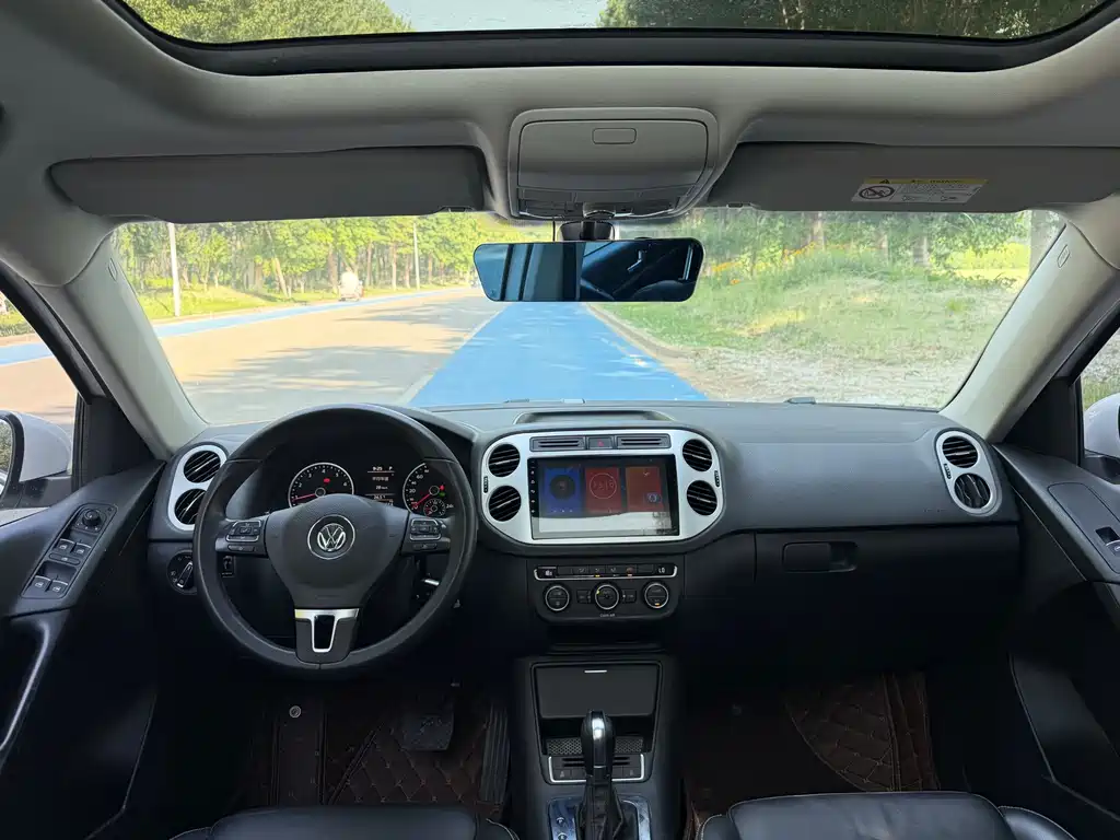 Volkswagen Tiguan — фото 18