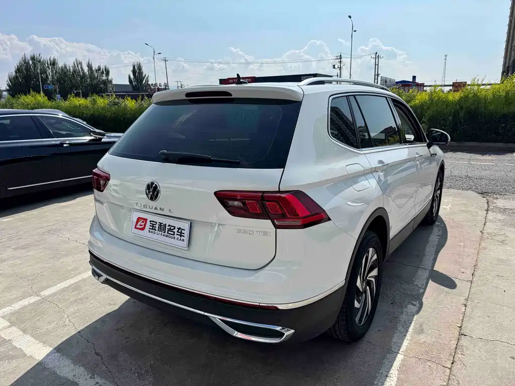 Volkswagen Tiguan L — фото 2