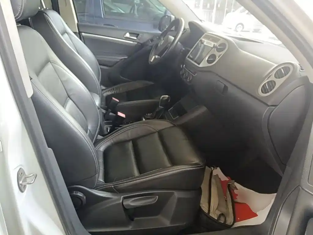 Volkswagen Tiguan — фото 25