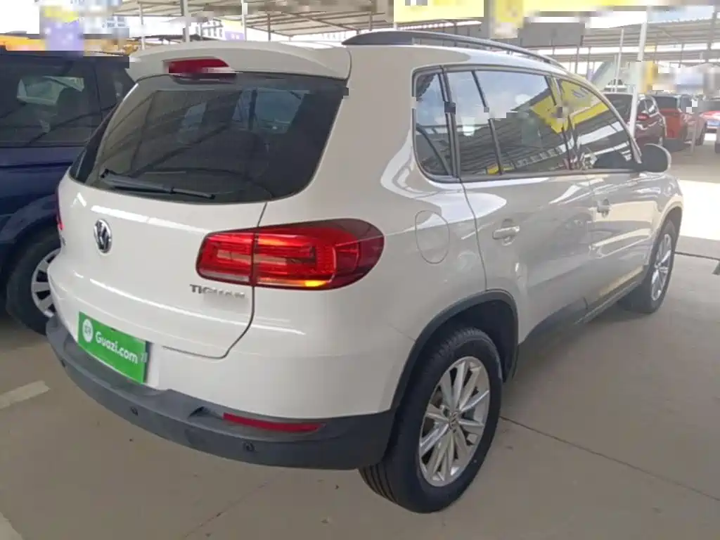 Volkswagen Tiguan — фото 7