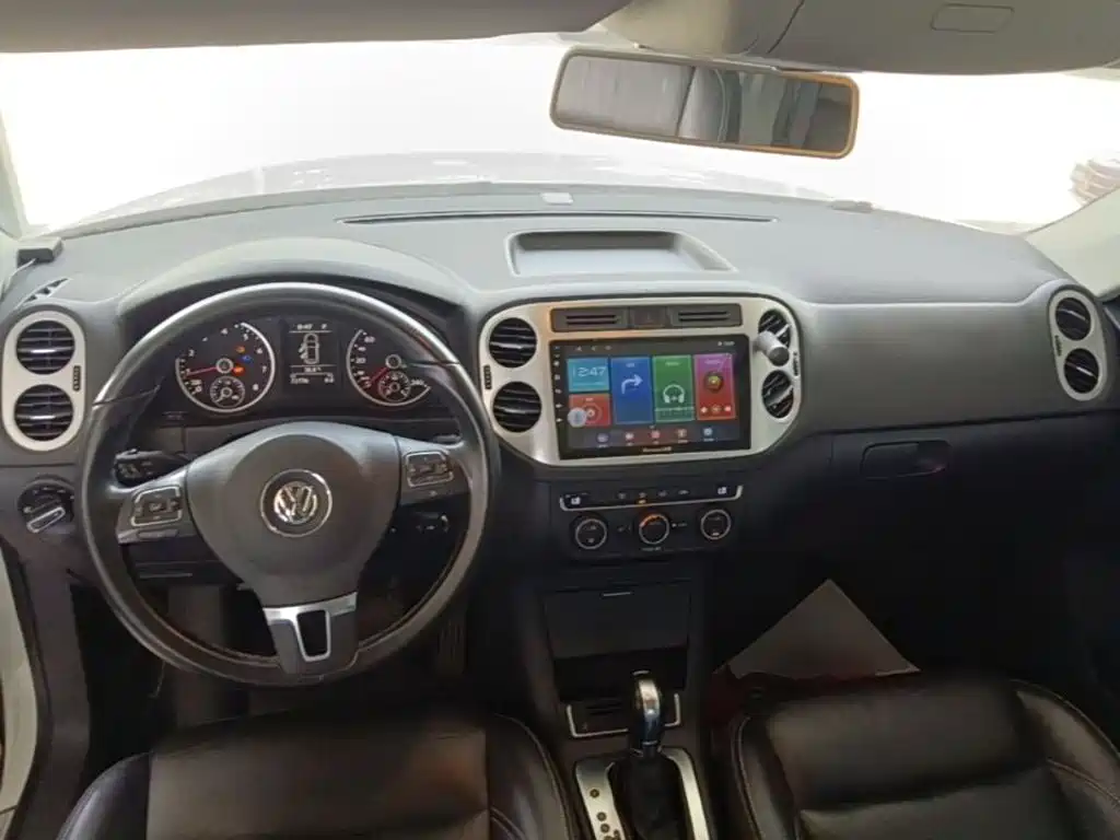Volkswagen Tiguan — фото 10