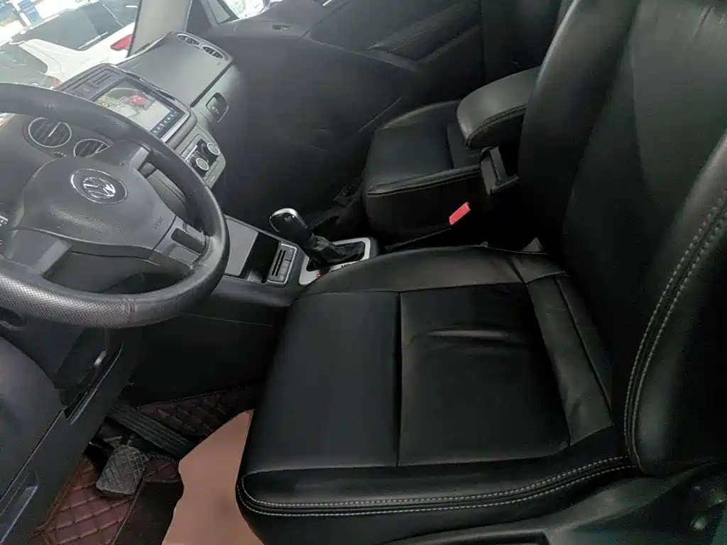 Volkswagen Tiguan — фото 15