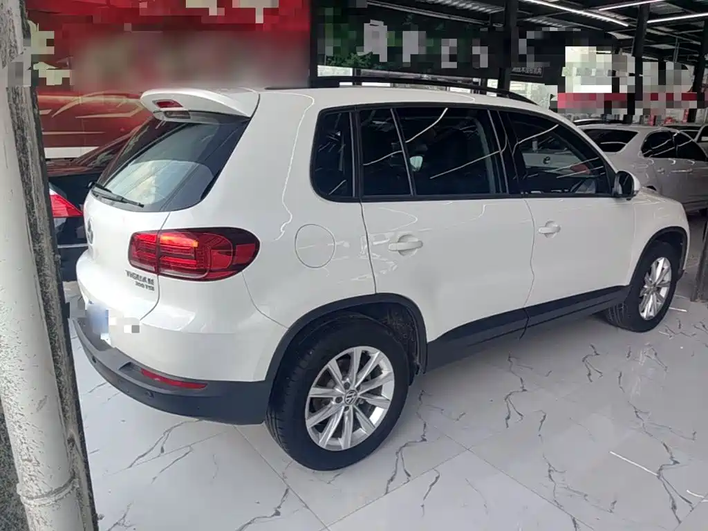 Volkswagen Tiguan — фото 7