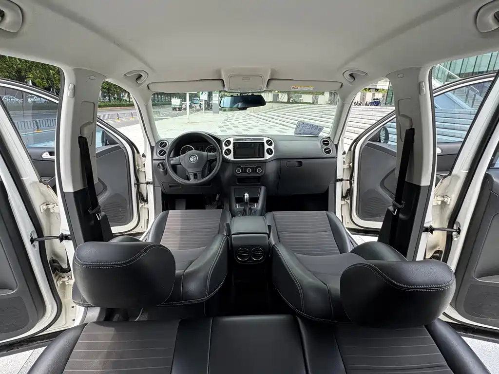 Volkswagen Tiguan — фото 9