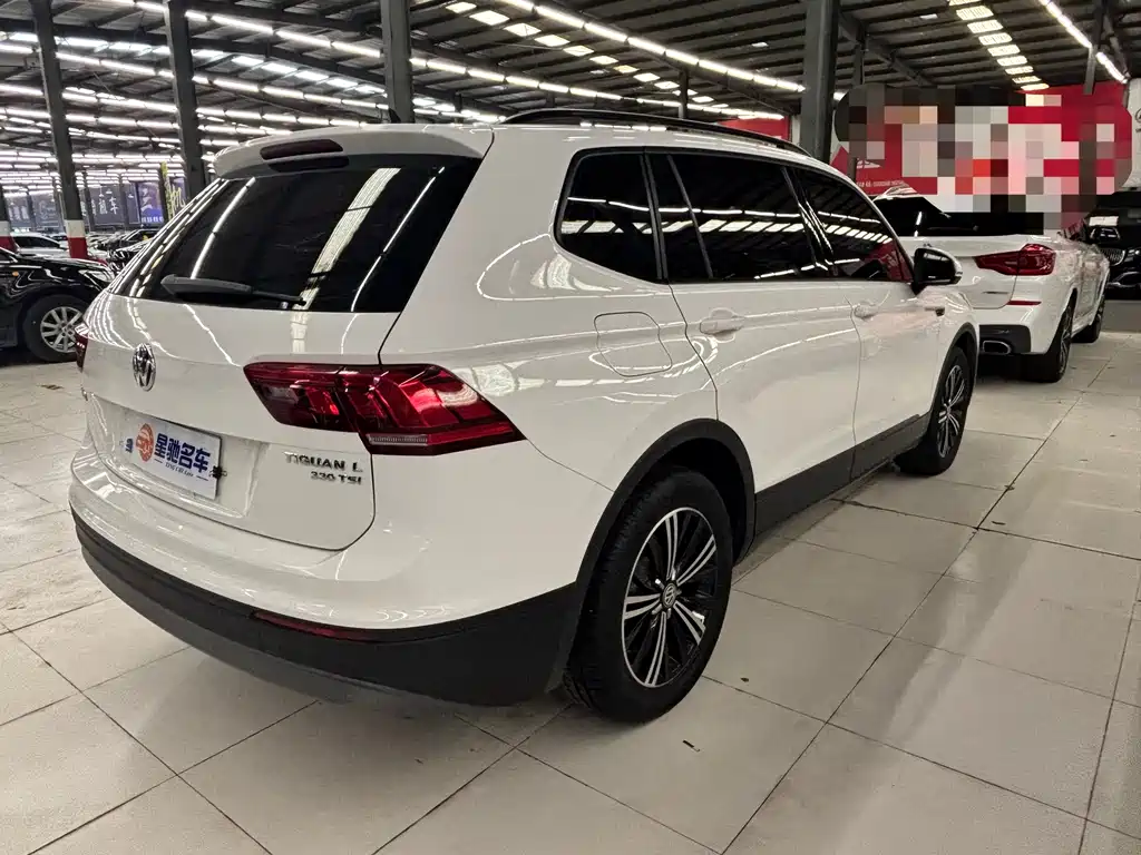 Volkswagen Tiguan L — фото 14