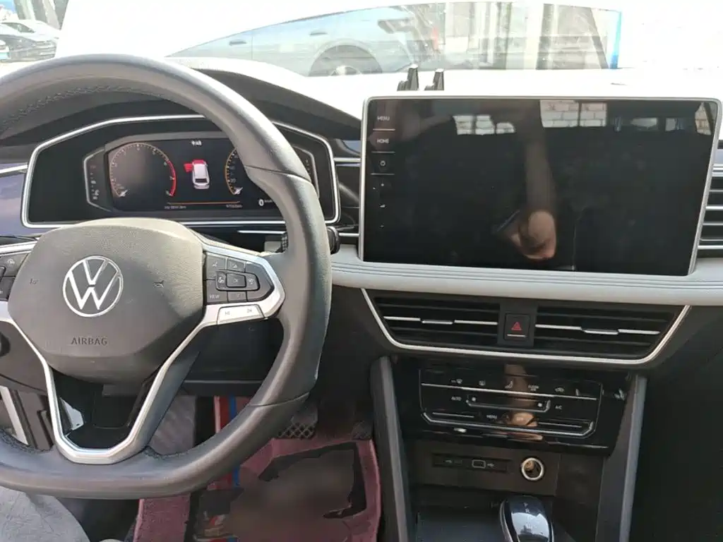 Volkswagen Tiguan L — фото 10