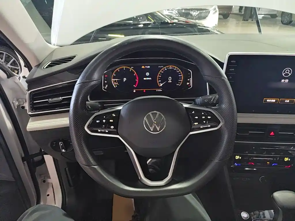 Volkswagen Tiguan L — фото 7