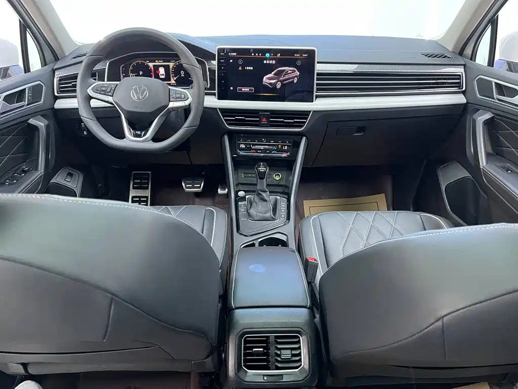 Volkswagen Tiguan L — фото 21