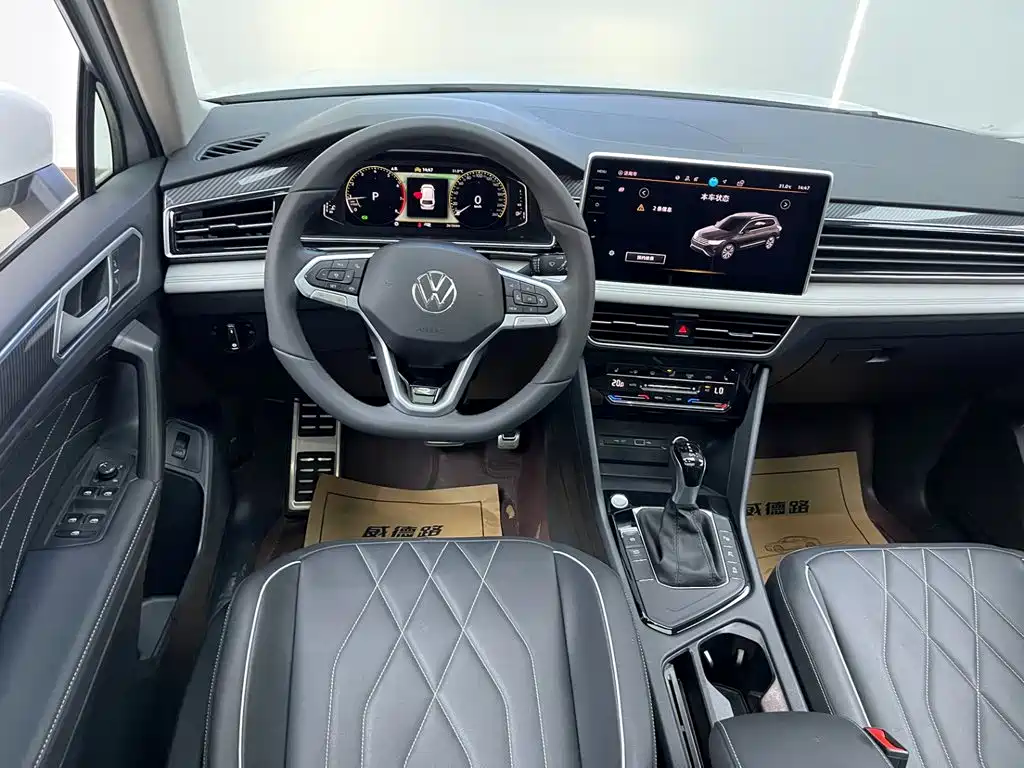 Volkswagen Tiguan L — фото 24