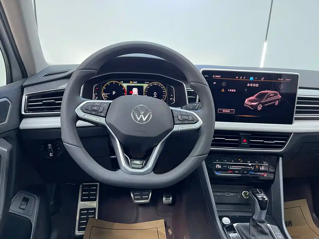 Volkswagen Tiguan L — фото 25