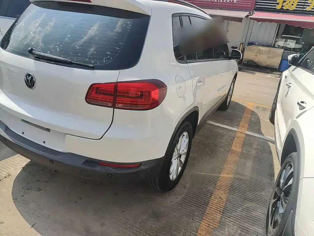 Volkswagen Tiguan — фото 8