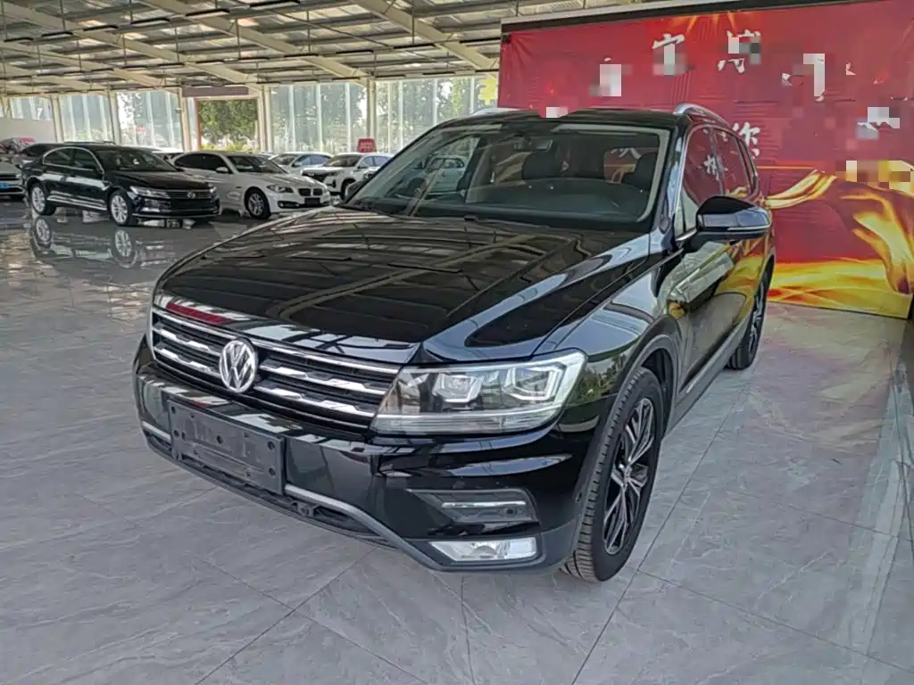 Volkswagen Tiguan L — фото 2