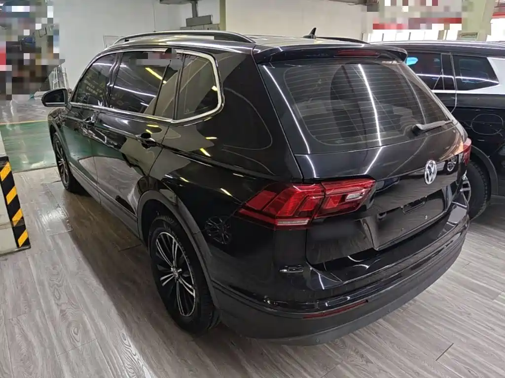 Volkswagen Tiguan L — фото 5