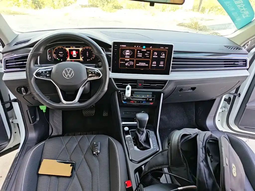 Volkswagen Tiguan L — фото 10