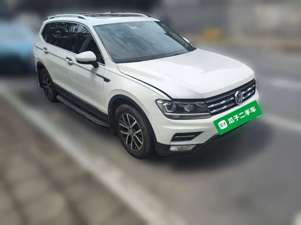 Volkswagen Tiguan L — фото 24