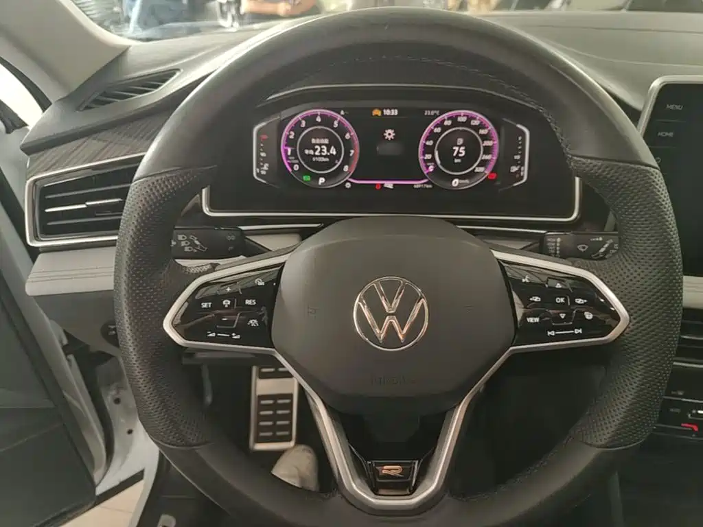 Volkswagen Tiguan L — фото 11