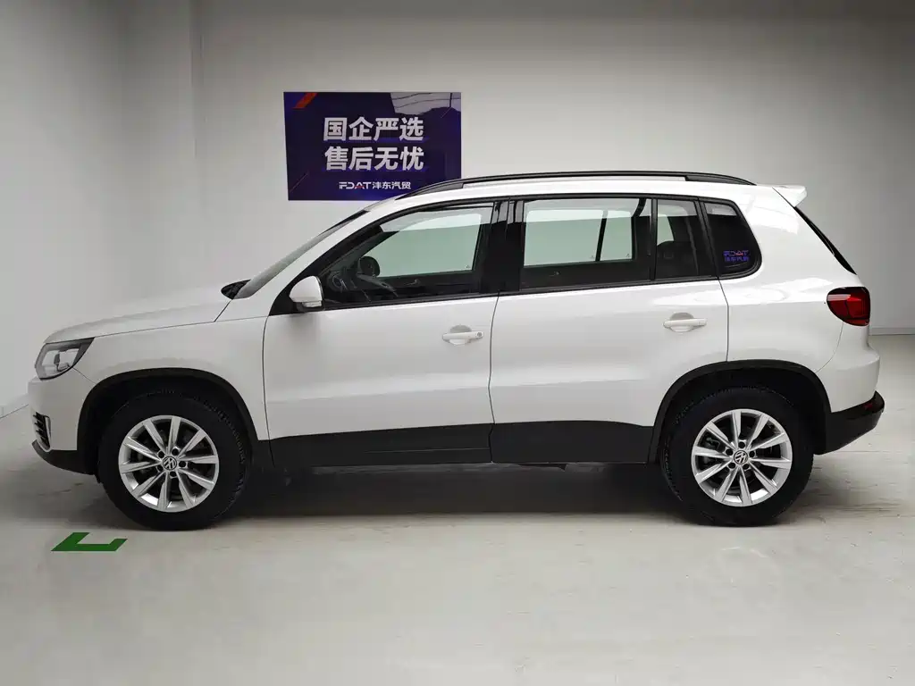 Volkswagen Tiguan — фото 9
