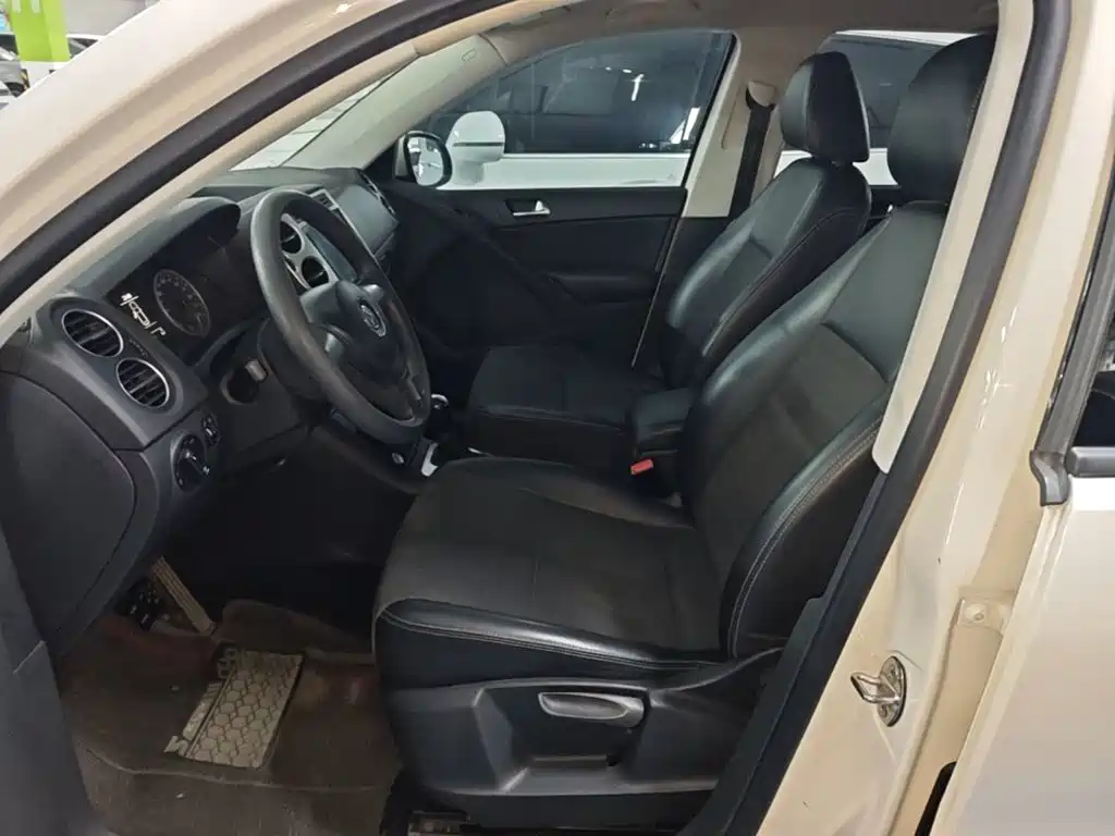 Volkswagen Tiguan — фото 15