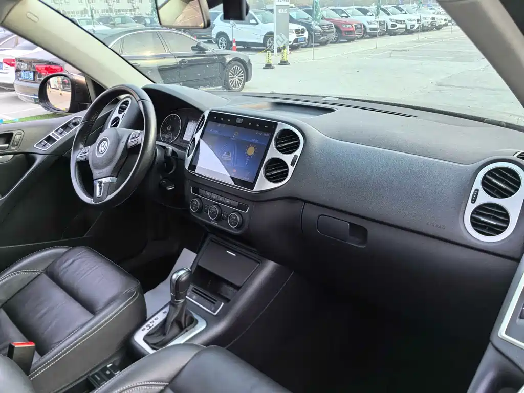 Volkswagen Tiguan — фото 18