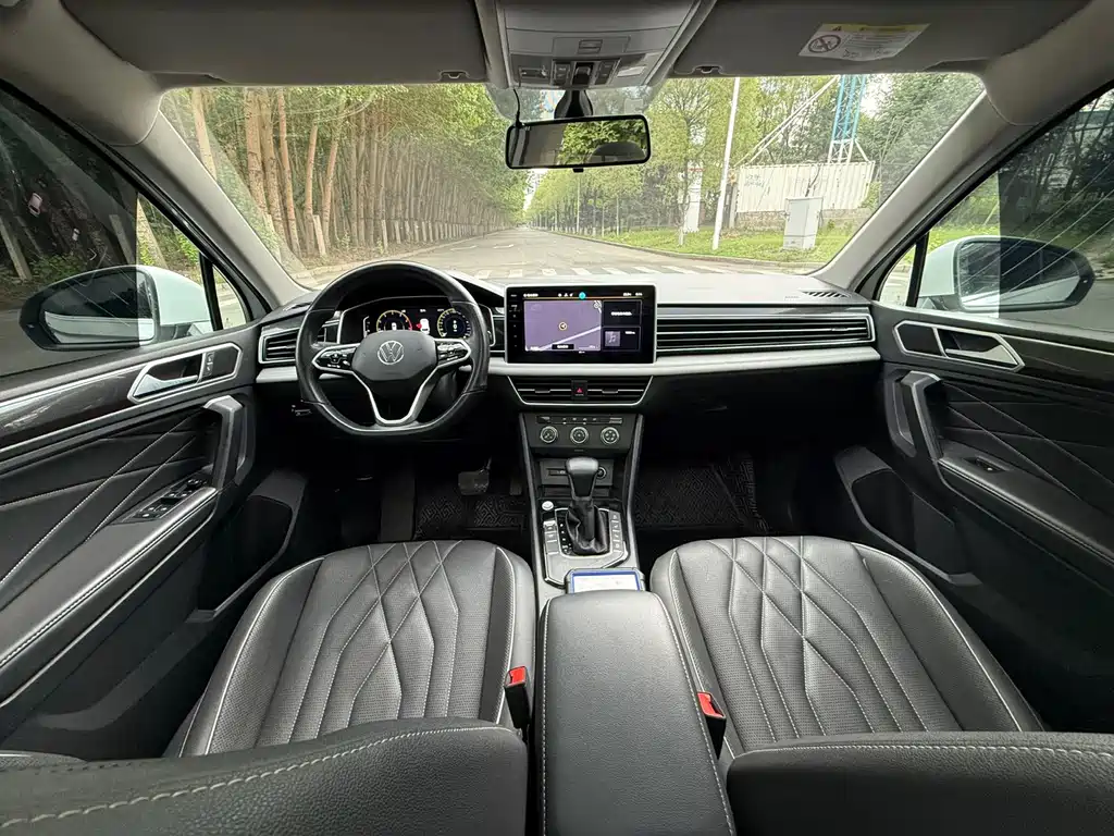 Volkswagen Tiguan L — фото 7