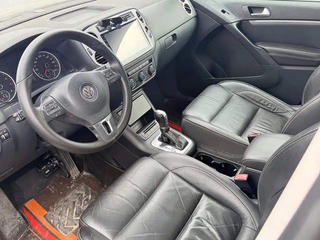 Volkswagen Tiguan — фото 7