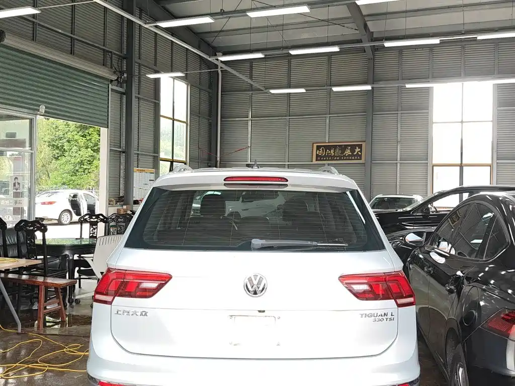 Volkswagen Tiguan L — фото 4