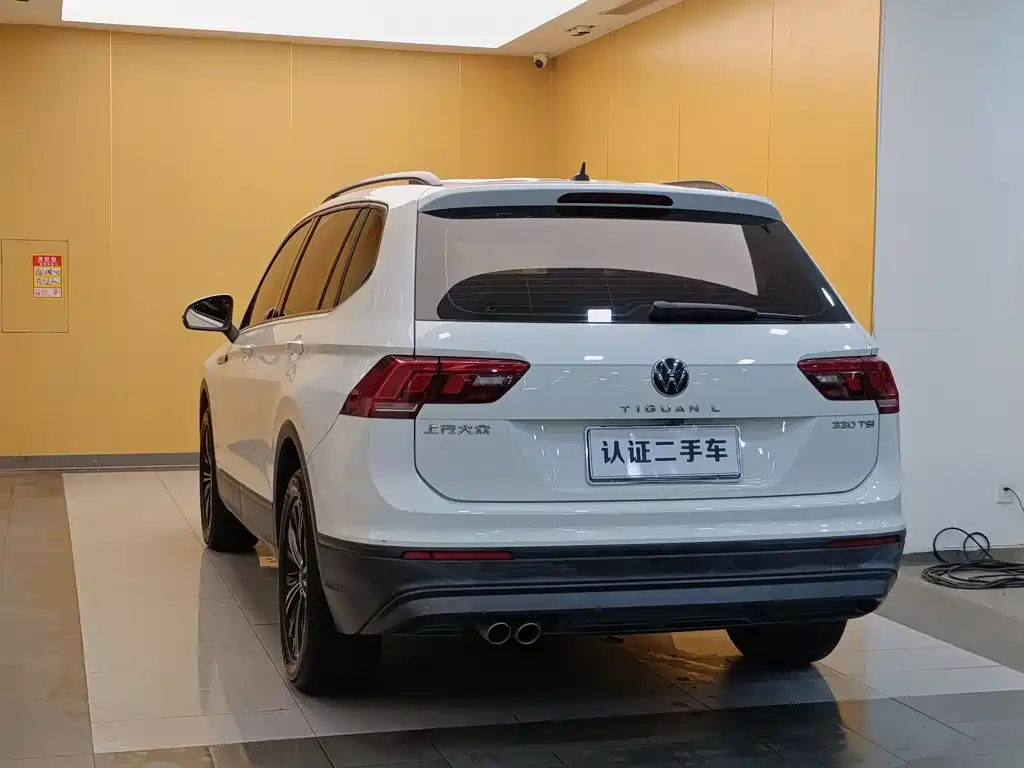 Volkswagen Tiguan L — фото 25