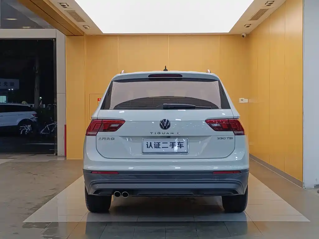 Volkswagen Tiguan L — фото 28