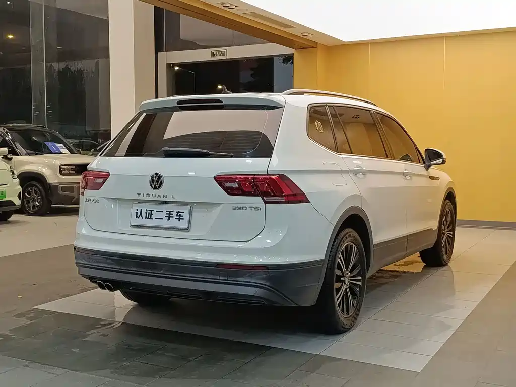 Volkswagen Tiguan L — фото 29