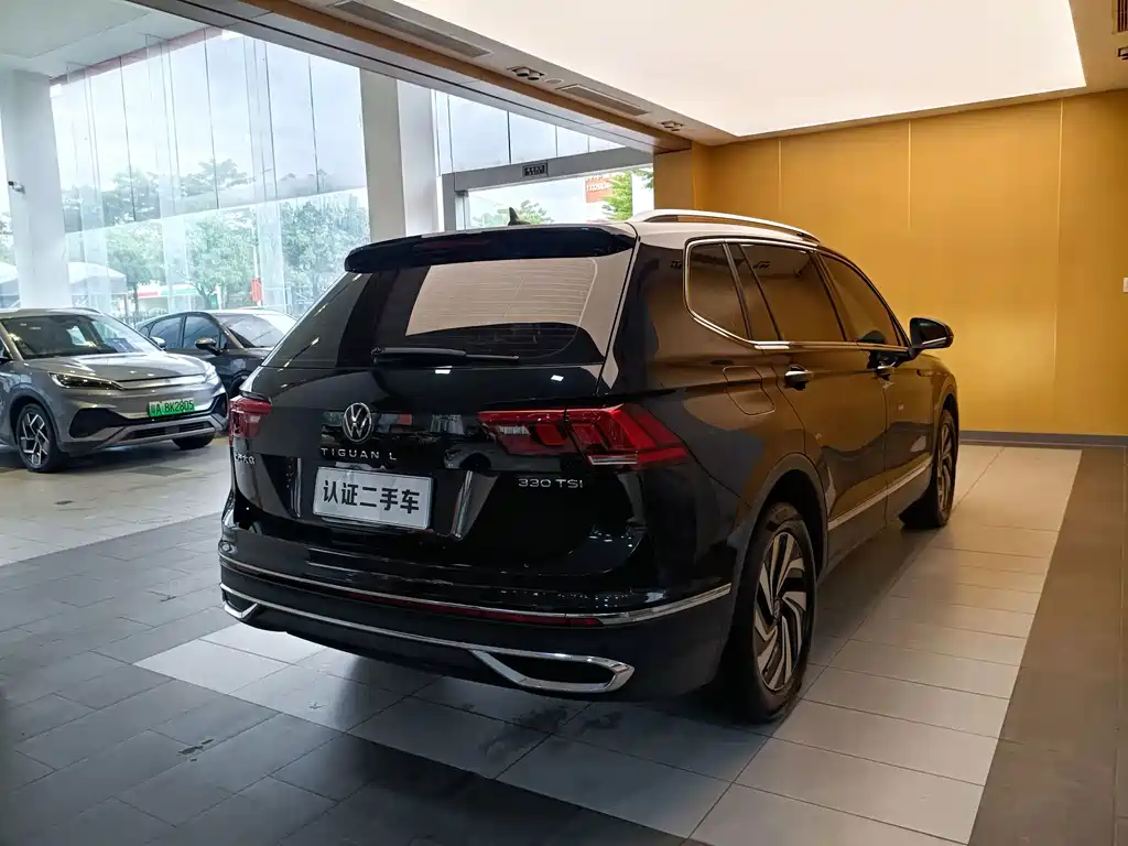 Volkswagen Tiguan L — фото 29