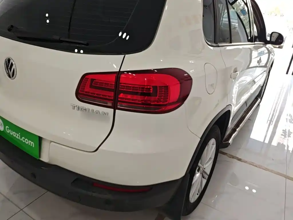 Volkswagen Tiguan — фото 8