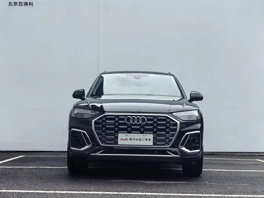 Audi Q5L — фото 11