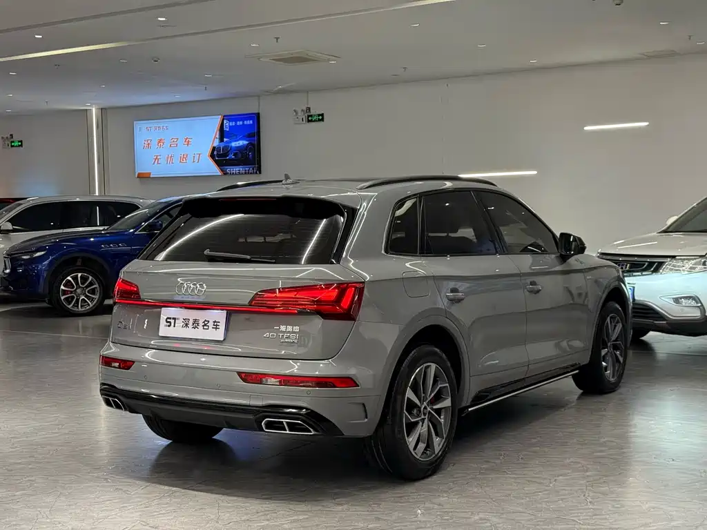 Audi Q5L — фото 11