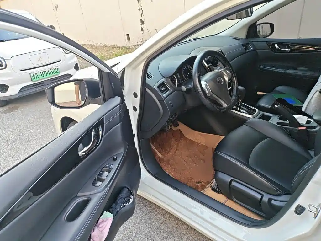 Nissan Tiida — фото 17
