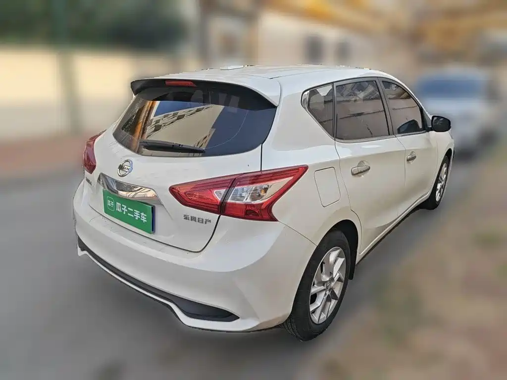 Nissan Tiida — фото 6