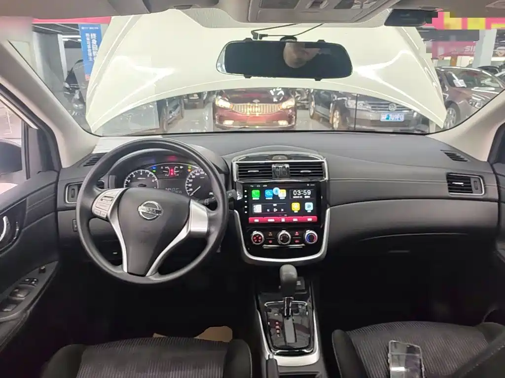 Nissan Tiida — фото 10