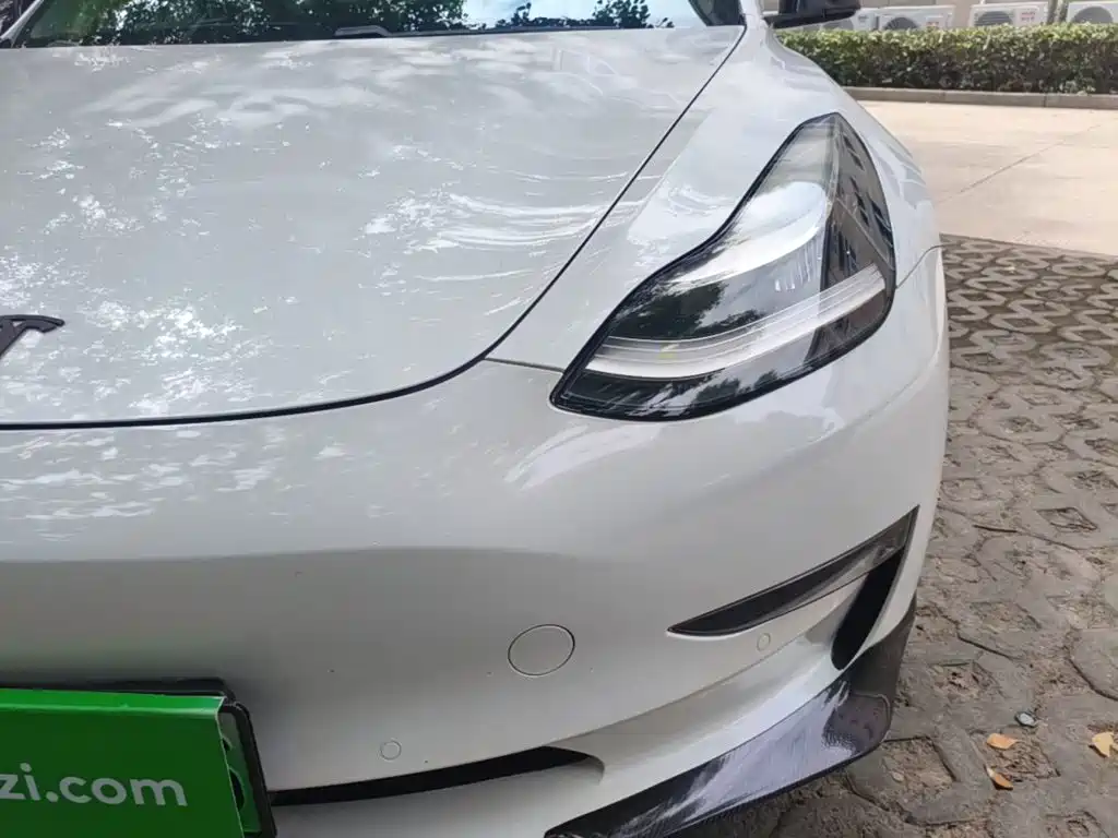 Tesla Model 3 — фото 24