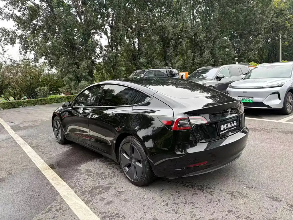 Tesla Model 3 — фото 11