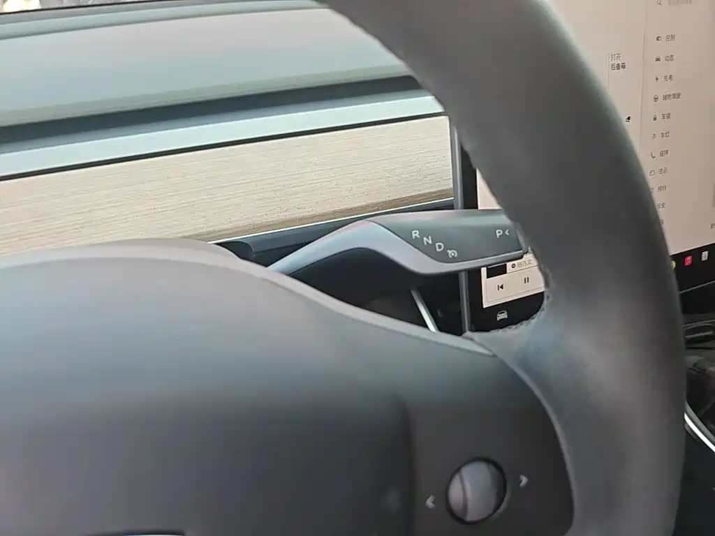 Tesla Model 3 — фото 14