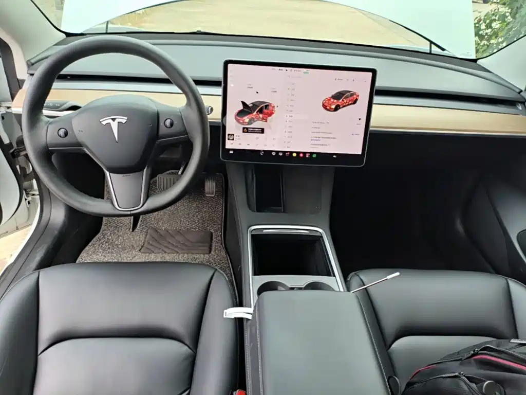 Tesla Model 3 — фото 13