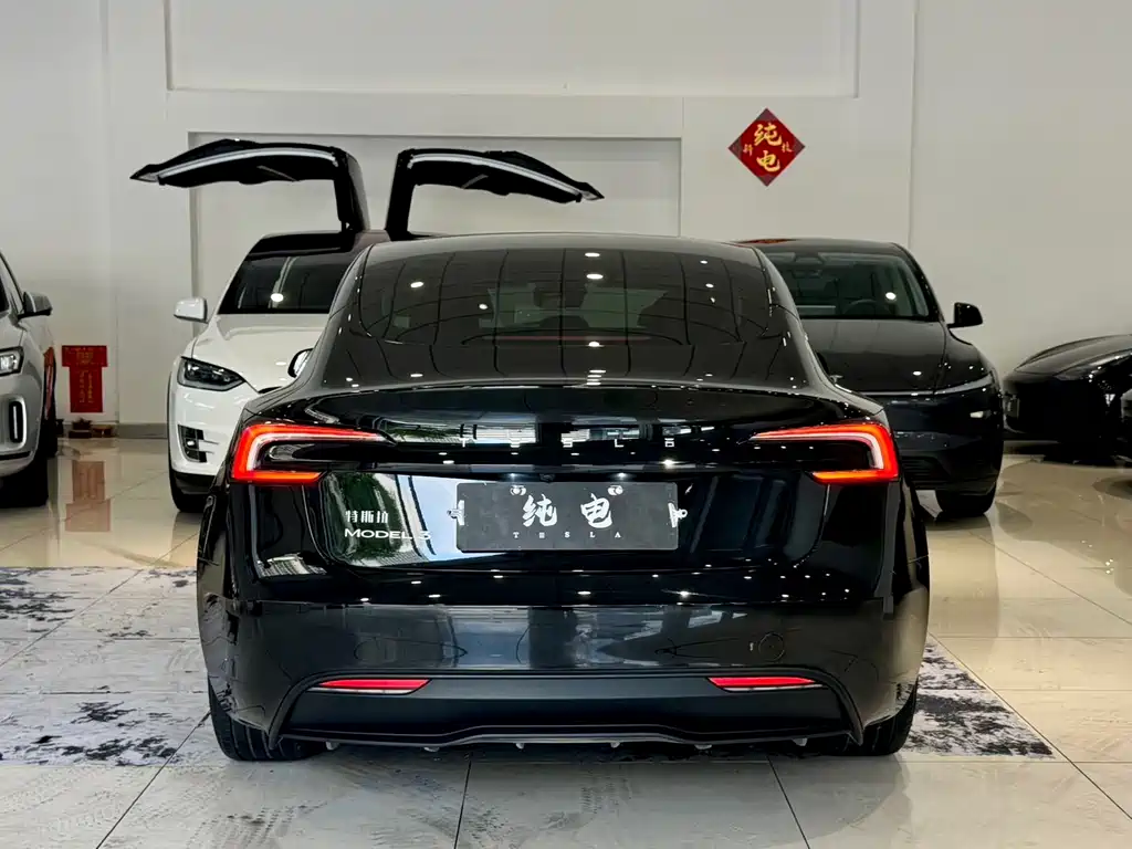 Tesla Model 3 — фото 14