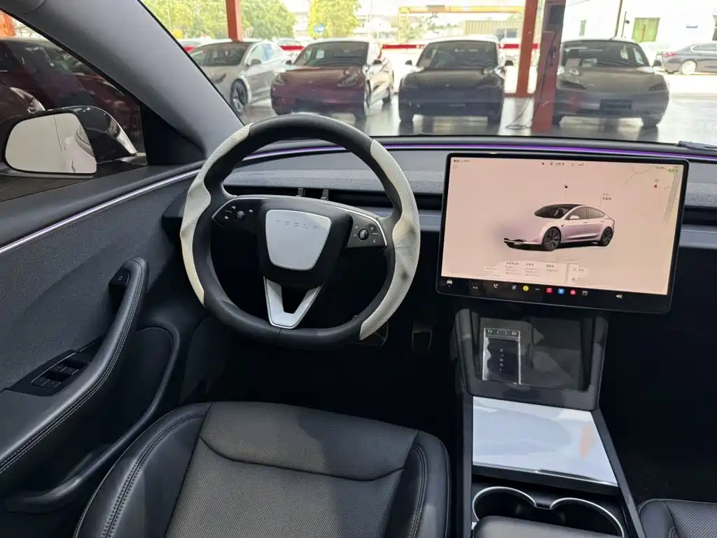 Tesla Model 3 — фото 11