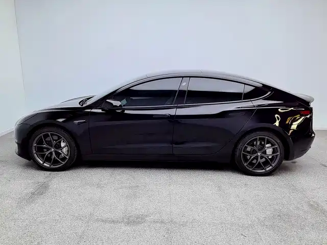 Tesla Model 3 — фото 11