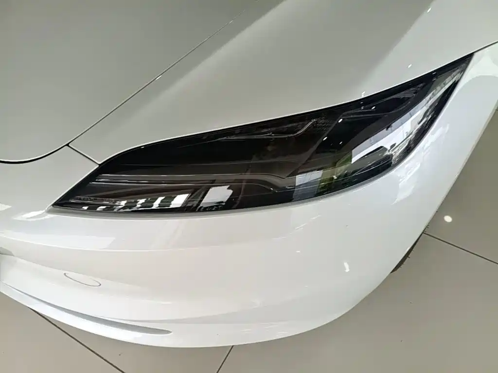 Tesla Model 3 — фото 24